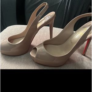Loubi’s lady peep sling backs in nude. Practically brand new.